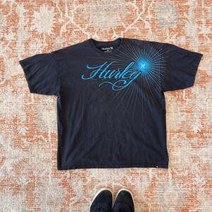 Vintage Y2K Hurley 'The Movement' Graphic T-Shirt